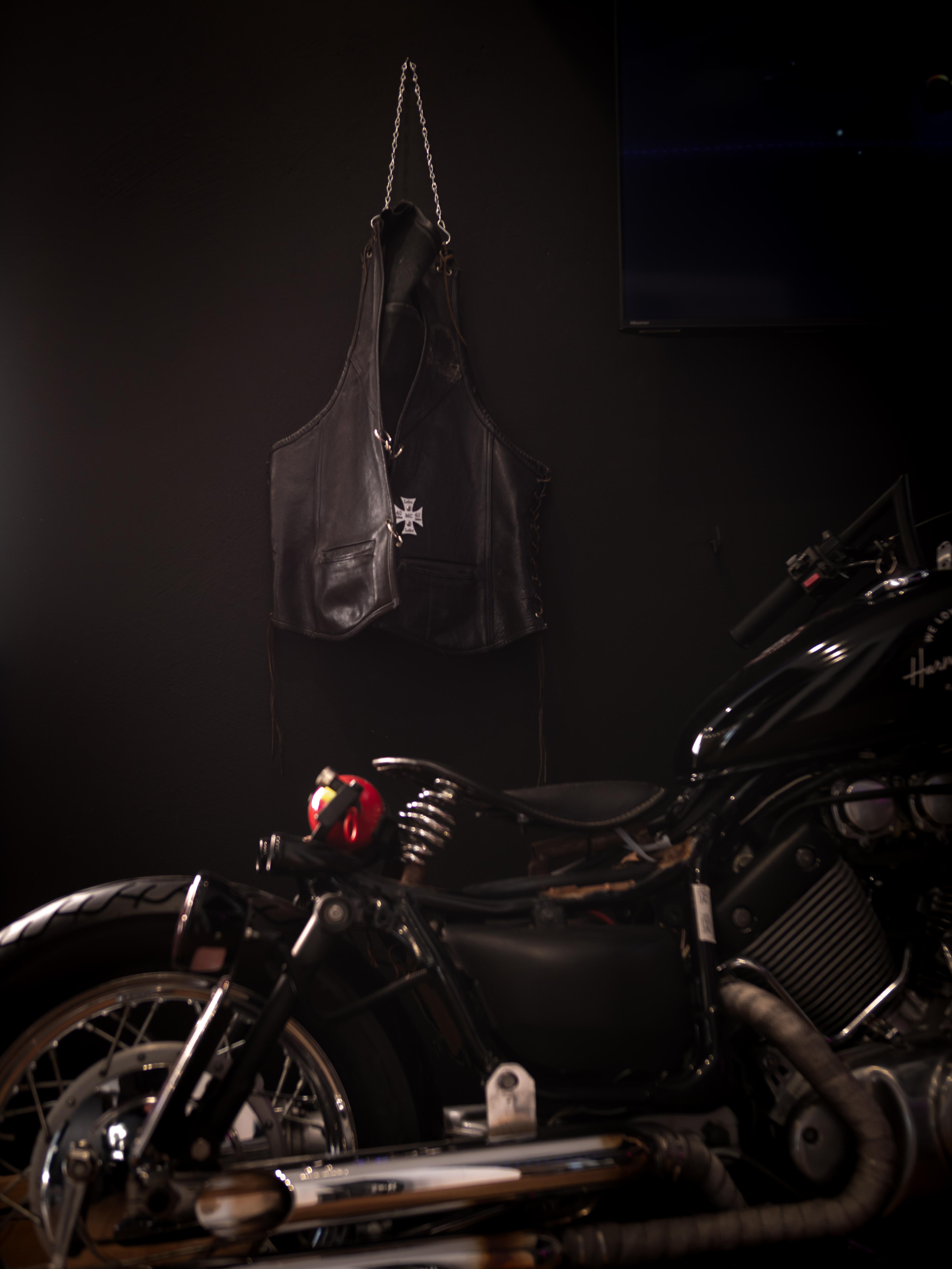 Leather vest as decor in the studio — Harmony of Ink Homburg